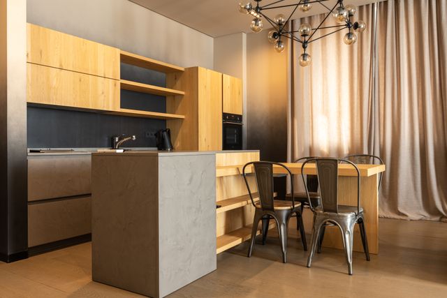 contemporary%20kitchen%20and%20dining%20area%20with%20wooden%20decor